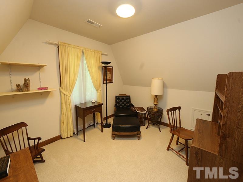 8600 Valley Brook Drive Raleigh, NC 27613 - Photo 12 of 25 a living room with furniture