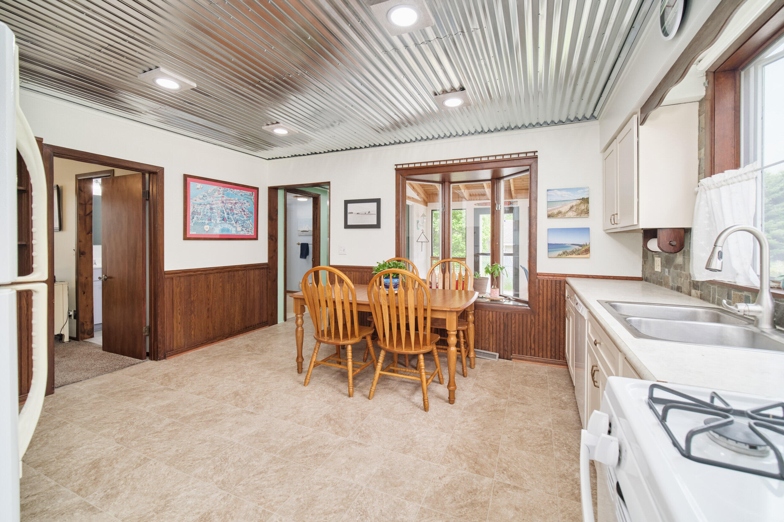3750 River Road Manistee, MI 49660 - Photo 18 of 60 Bay window into 3 season room