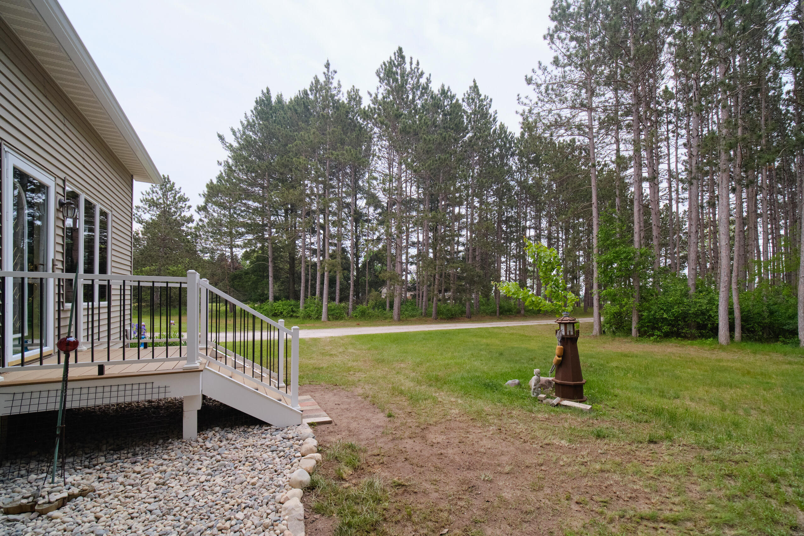 3750 River Road Manistee, MI 49660 - Photo 50 of 60 Newer composite front porch