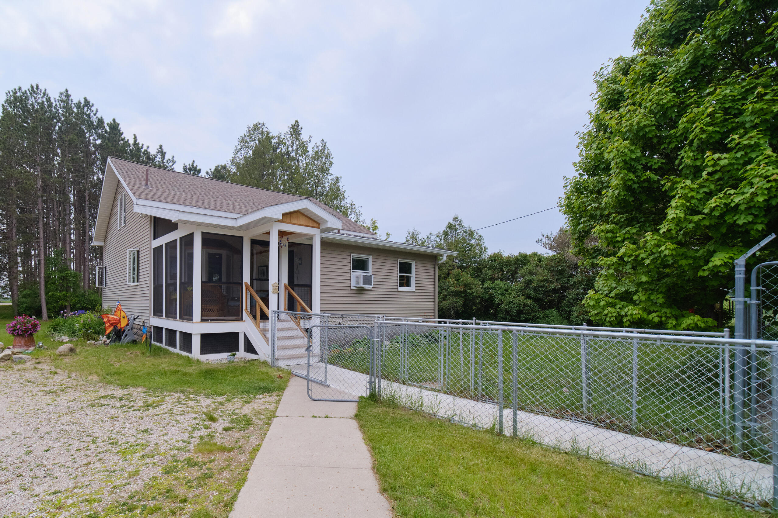 3750 River Road Manistee, MI 49660 - Photo 52 of 60 Fencing run right up to back door