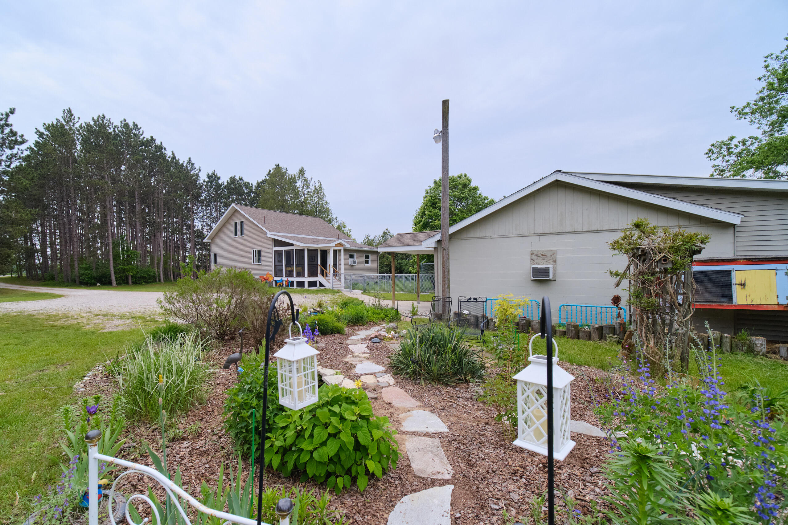 3750 River Road Manistee, MI 49660 - Photo 6 of 60 Beautiful perennial garden w/ponds