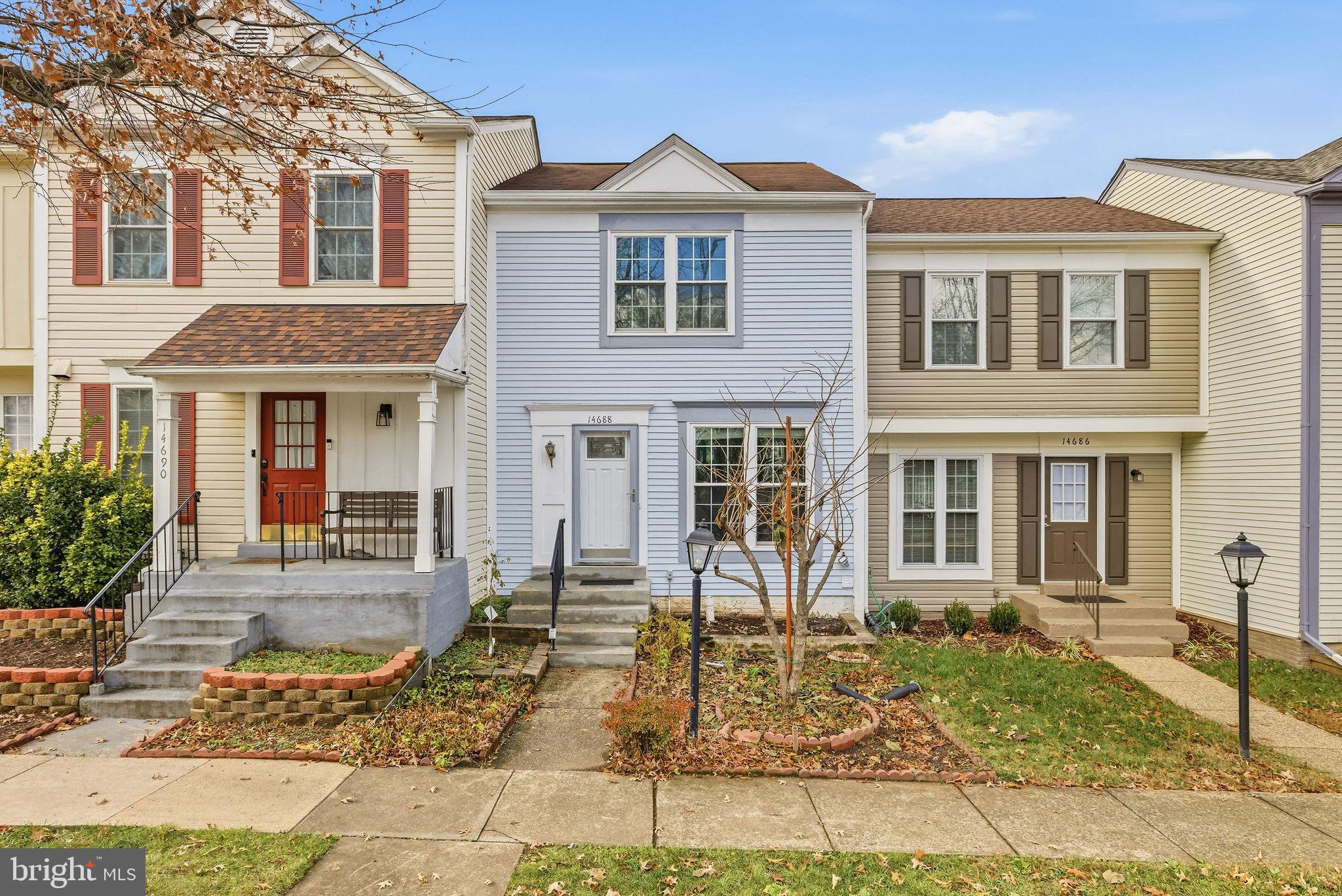 14688 Basingstoke Loop Centreville, VA 20120 - Photo 1 of 34 front view of a house with a yard