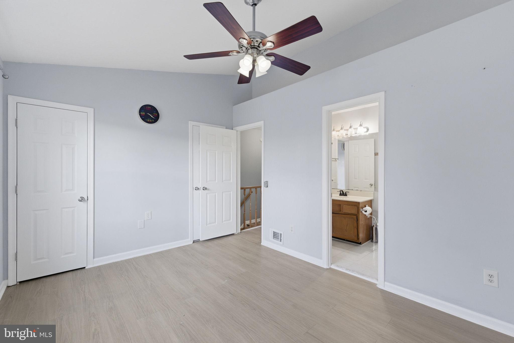 14688 Basingstoke Loop Centreville, VA 20120 - Photo 24 of 34 a view of an empty room with a ceiling fan