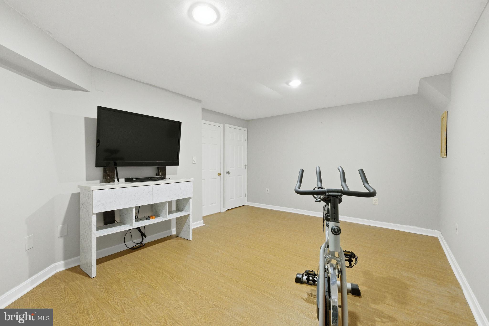 14688 Basingstoke Loop Centreville, VA 20120 - Photo 29 of 34 a view of a livingroom with a flat screen tv