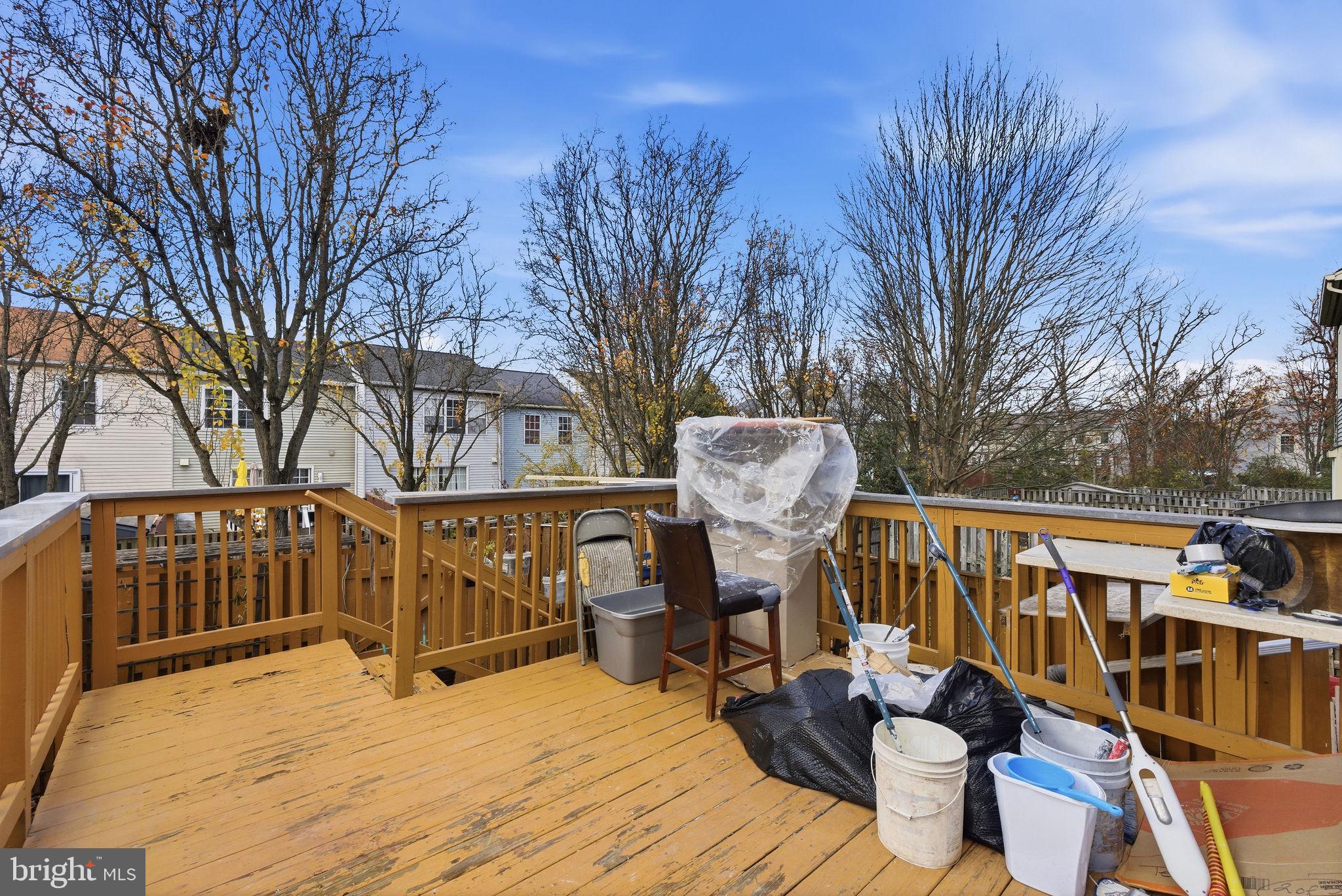 14688 Basingstoke Loop Centreville, VA 20120 - Photo 32 of 34 a view of a deck with chairs and wooden fence