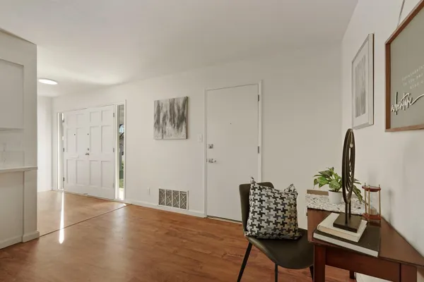 a view of workspace with wooden floor