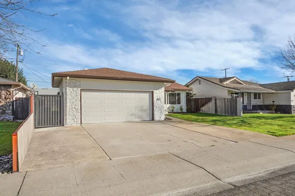 a front view of house with yard