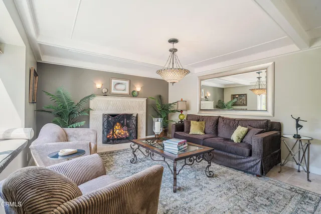 a kitchen with stainless steel appliances granite countertop a sink and dishwasher a stove top oven with wooden floor