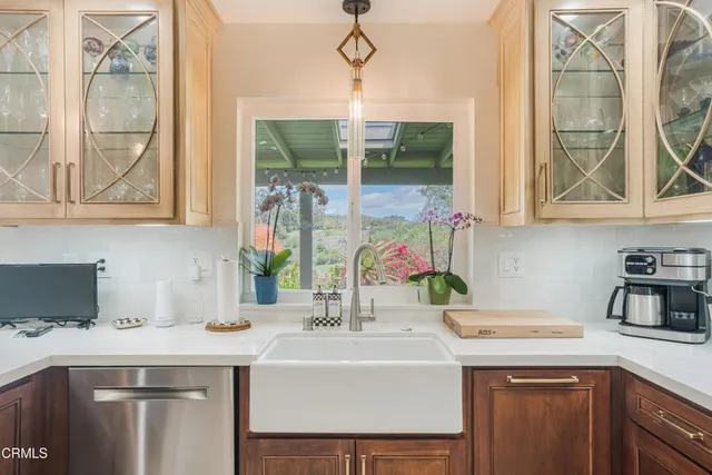 a living room with furniture and windows