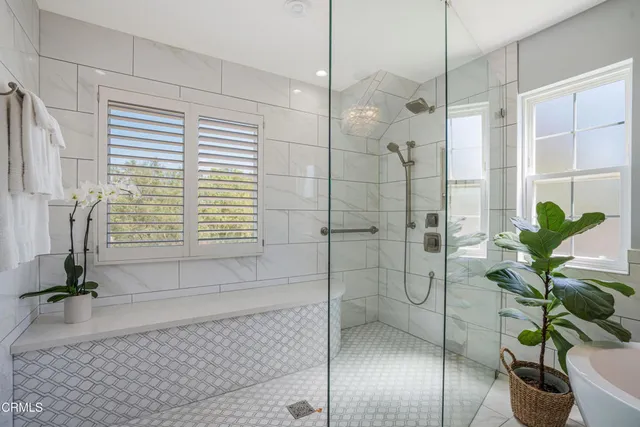 a view of a porch with furniture and yard