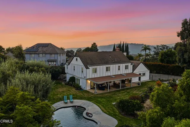 a view of a city with mountains in the background