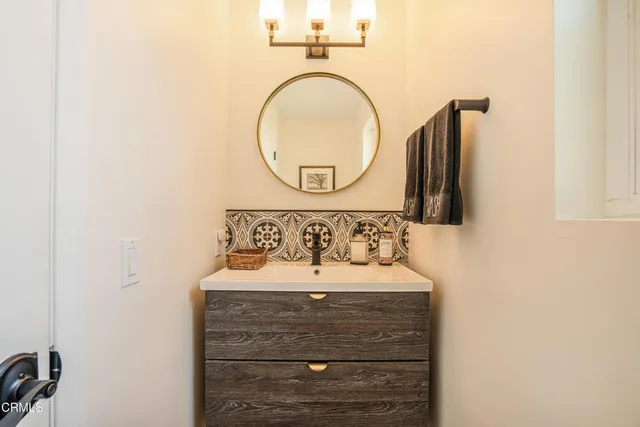 an aerial view of a house with a yard and garden