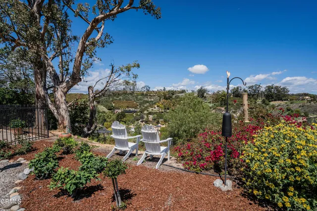 an aerial view of a house with a garden