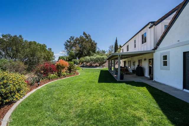 a front view of a house with a garage