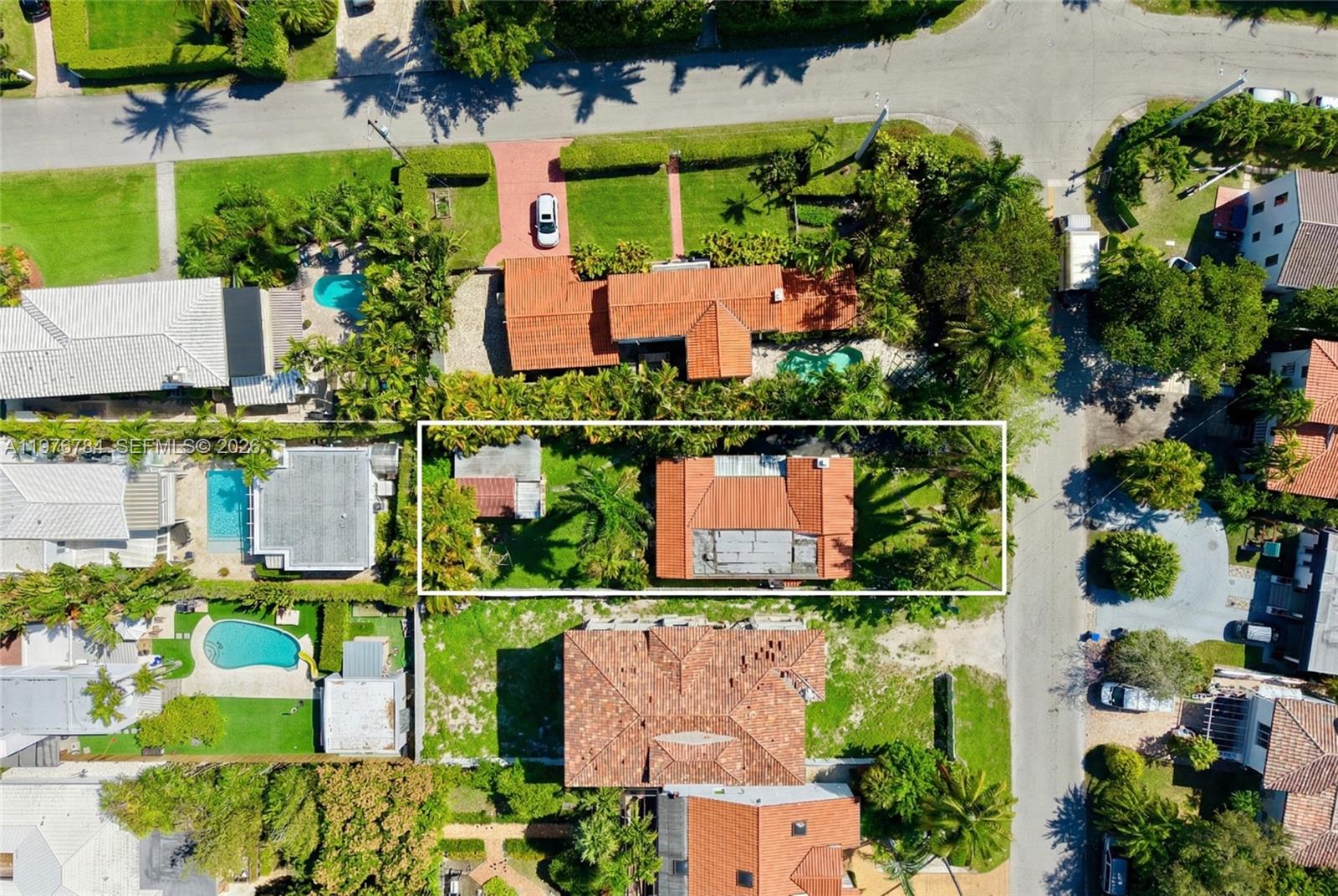 515 West 30th Street Miami Beach, FL 33140 - Photo 2 of 8 an aerial view of houses and roads