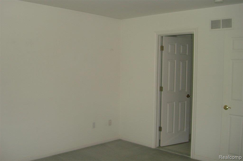 2115 Rochelle Park Drive, Unit 79 Rochester, MI 48309 - Photo 13 of 18 2nd Bedroom 1.JPG