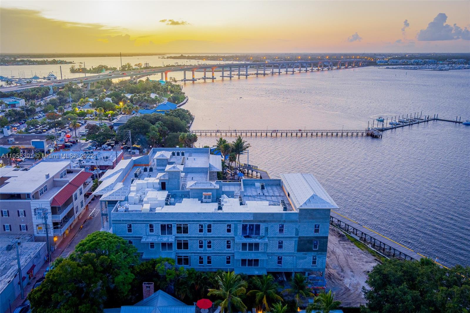 41 Southwest Seminole Street, Unit 203 Stuart, FL 34994 - Photo 8 of 17 a view of a city and an ocean view