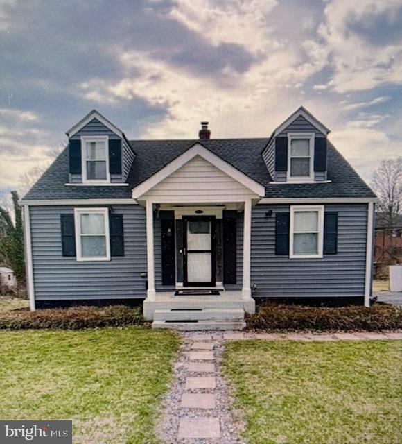 6601 Dogwood Road Baltimore, MD 21207 - Photo 1 of 1 a front view of a house with a yard