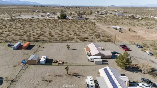 an aerial view of houses with outdoor space