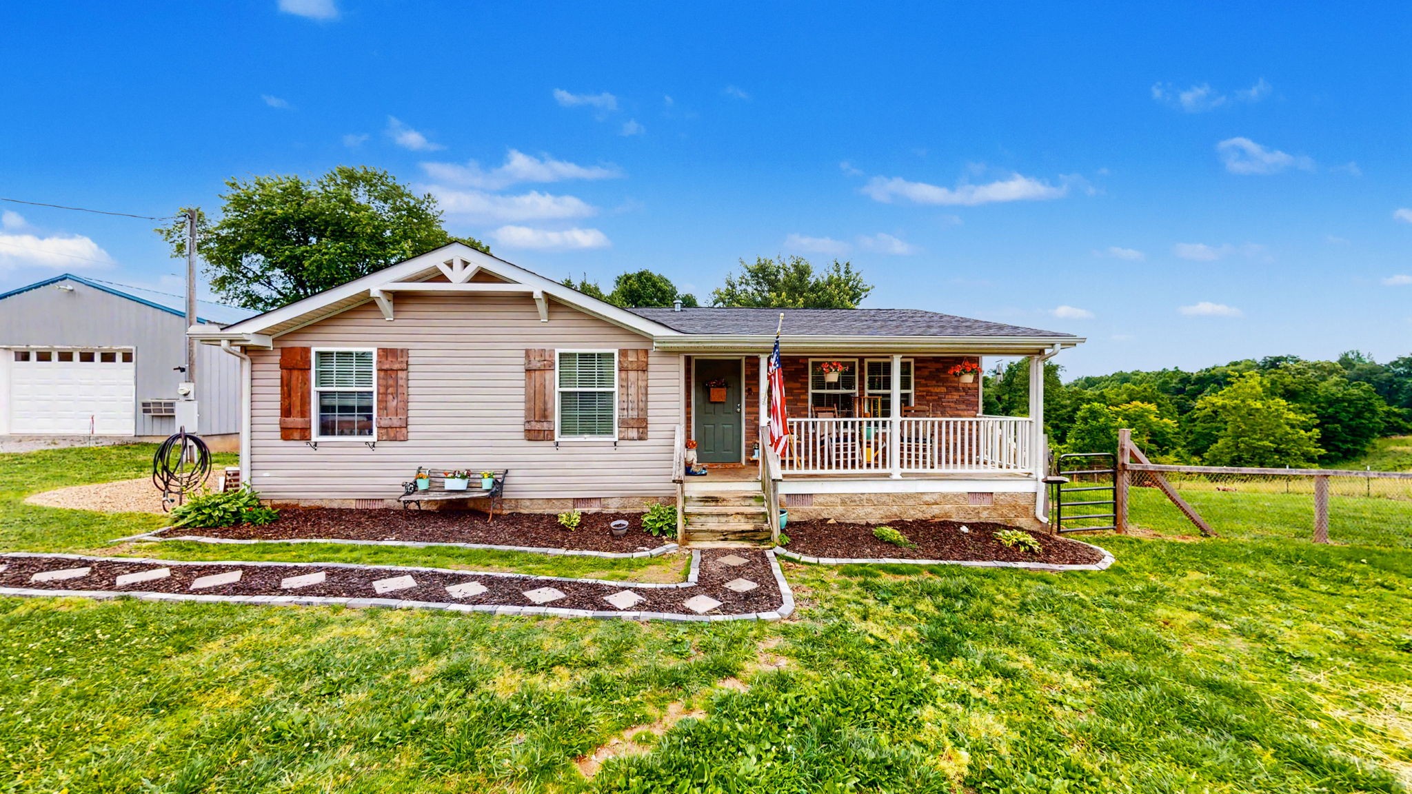 133 Cleveland Road Wartrace, TN 37183 - Photo 2 of 23 a view of a house with a yard patio and swimming pool