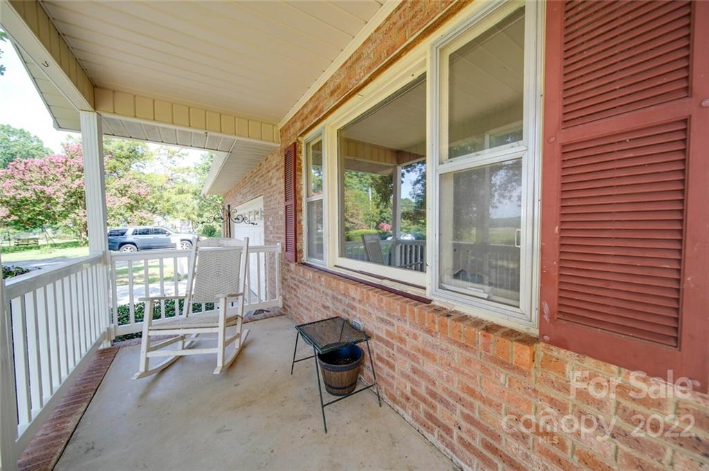 3210 Trinity Church Road Monroe, NC 28112 - Photo 15 of 29 a view of a room with wooden floor and outdoor space