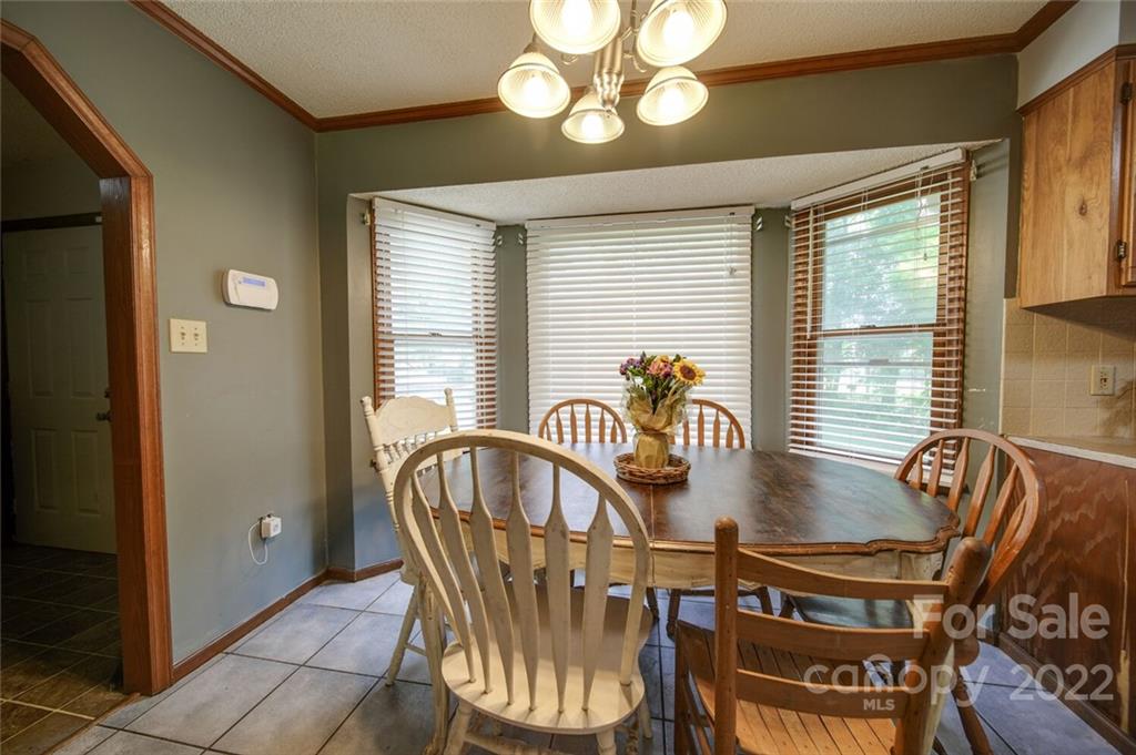 3210 Trinity Church Road Monroe, NC 28112 - Photo 19 of 29 a view of a dining room with furniture window and outside view