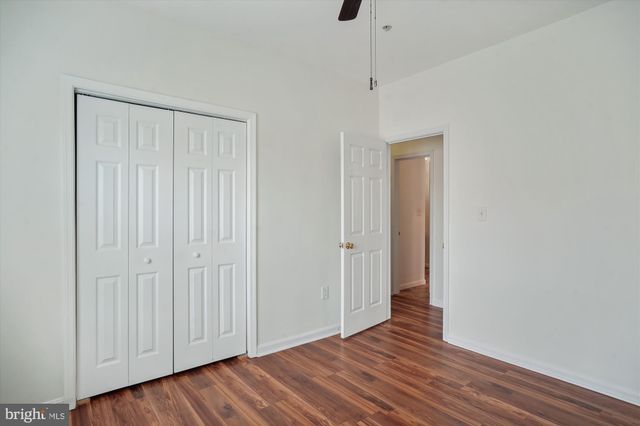 a view of a livingroom with wooden floor