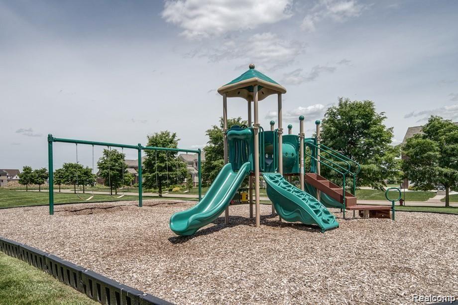 2299 Steeple Chase Road Canton, MI 48188 - Photo 15 of 15 Community play park, volleyball courts, and tennis courts