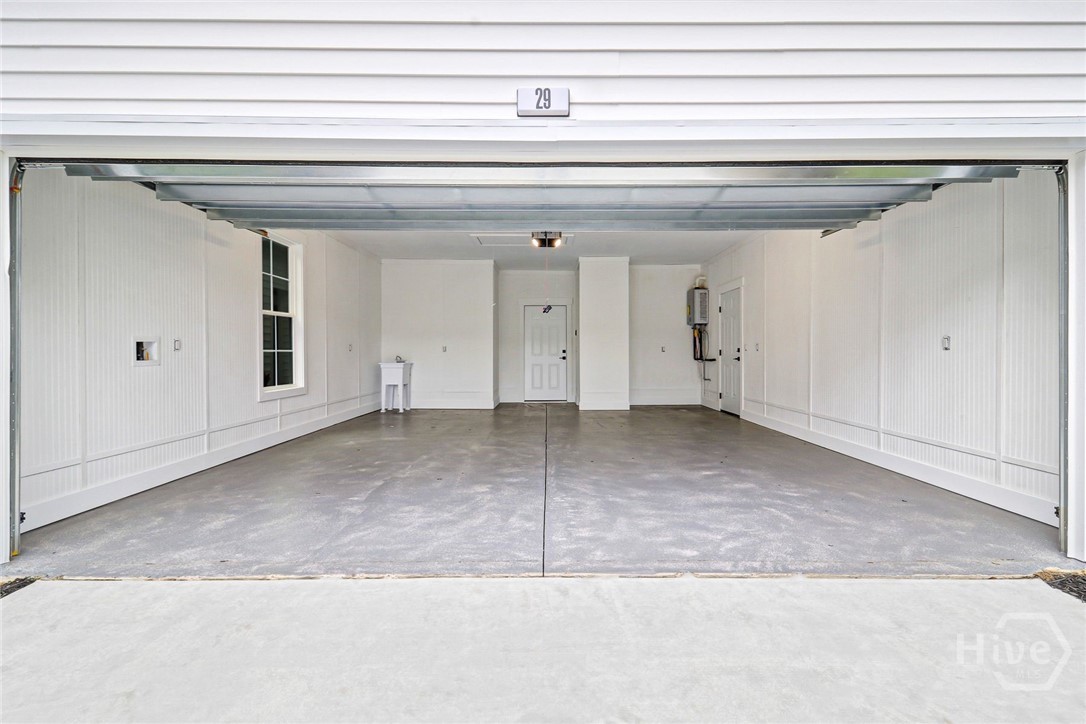 29 Hamilton Drive Bluffton, SC 29909 - Photo 30 of 33 Fully finished garage with epoxy floor and wash basin