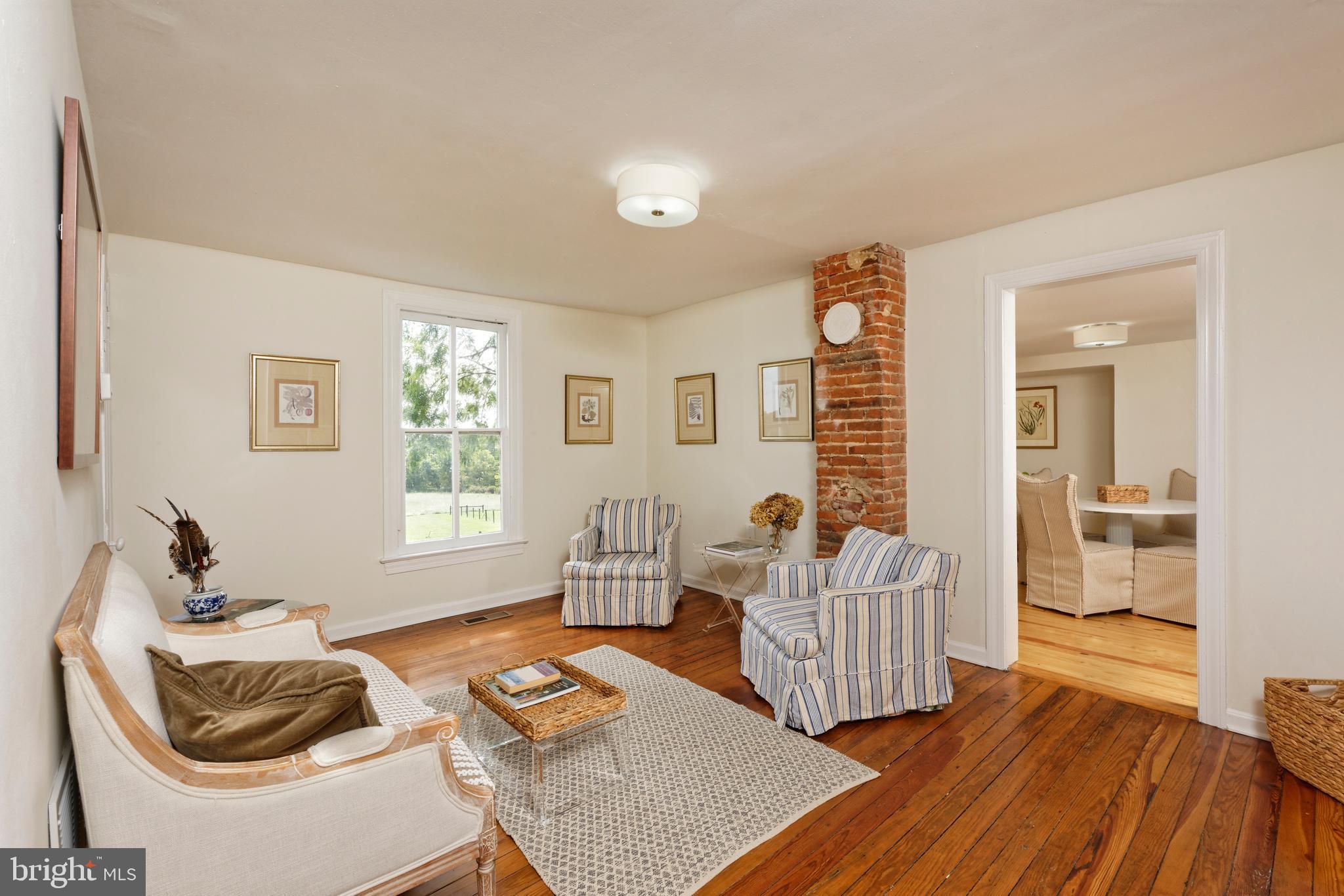 20532 Trappe Road Upperville, VA 20184 - Photo 31 of 63 Welcoming living room with old brick chimney