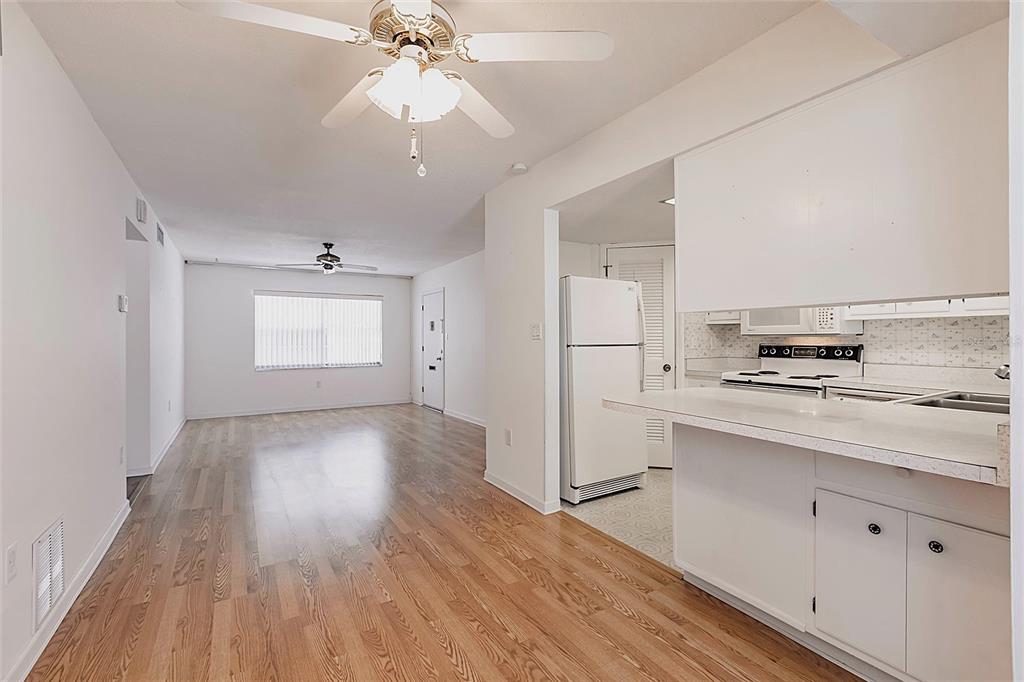 4158 Tamiami Trail, Unit S6 Port Charlotte, FL 33952 - Photo 12 of 39 a view of a kitchen with electric appliances