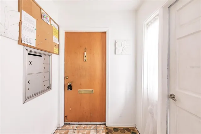 a view of a hallway with elevator