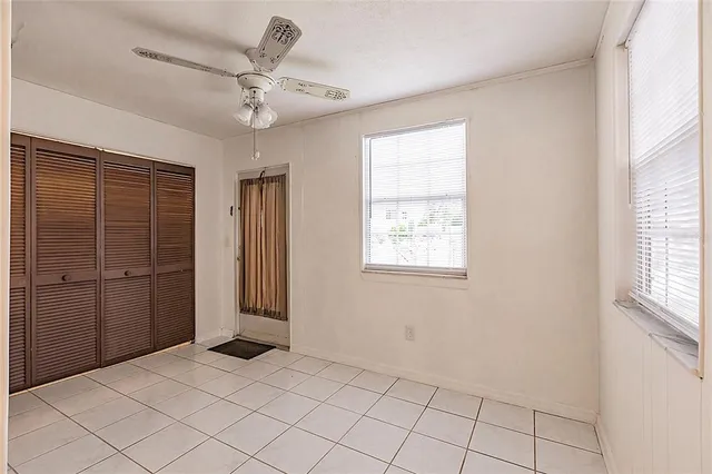 a view of an empty room with a window