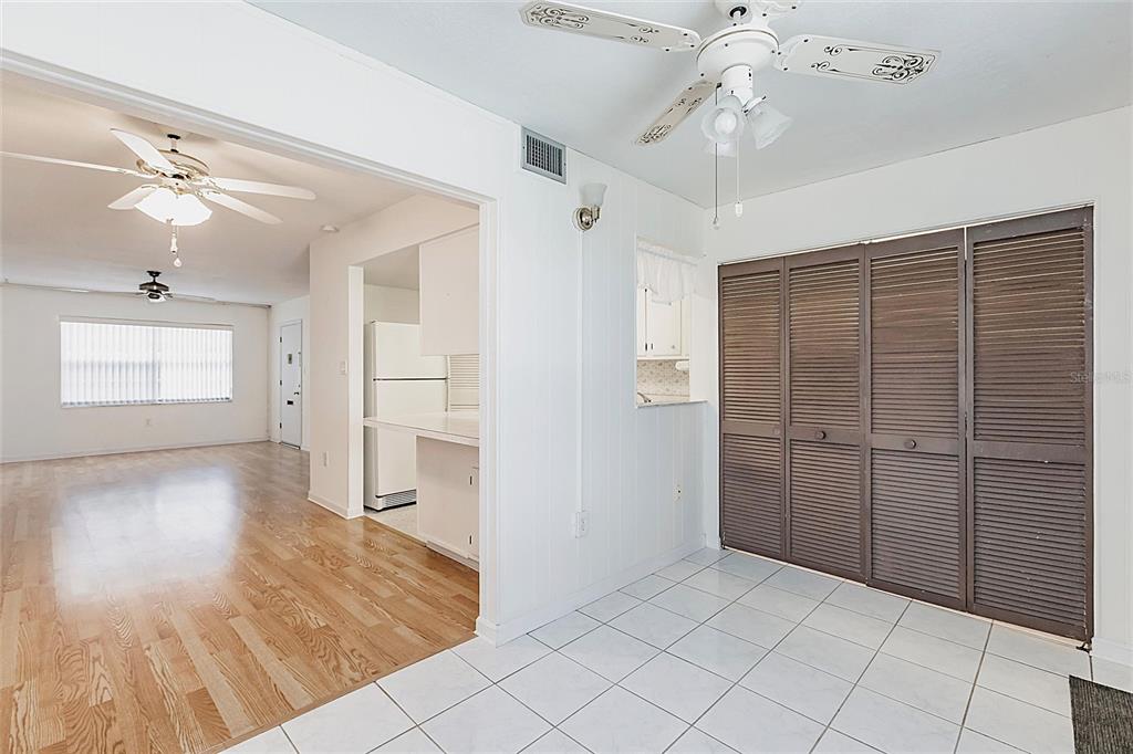 4158 Tamiami Trail, Unit S6 Port Charlotte, FL 33952 - Photo 25 of 39 wooden floor in an empty room with a window