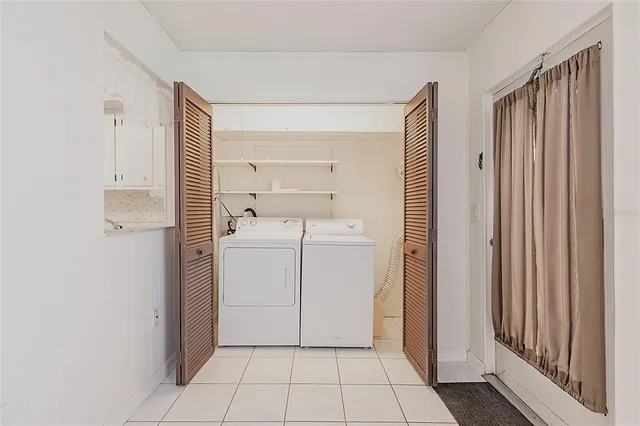 a view of a bathroom with utility room