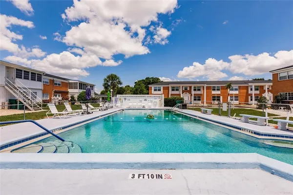 a view of a house with a swimming pool