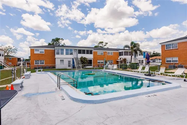 a view of a house with a swimming pool