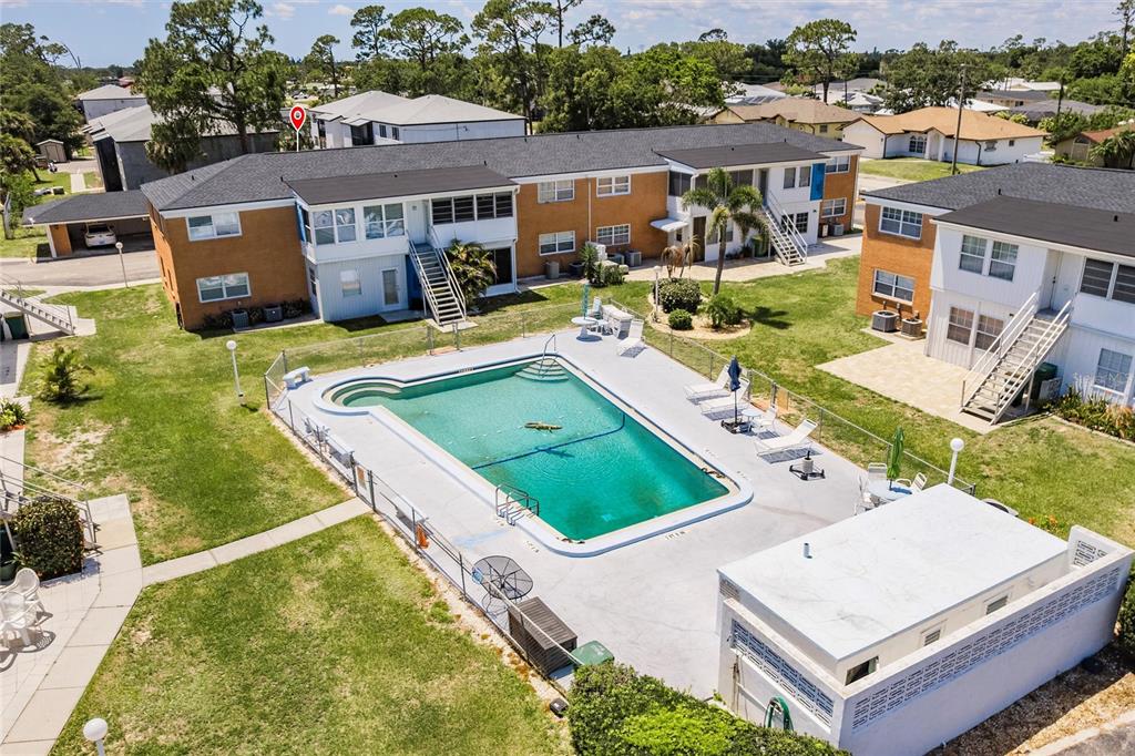 4158 Tamiami Trail, Unit S6 Port Charlotte, FL 33952 - Photo 33 of 39 an aerial view of a house with a garden and lake view