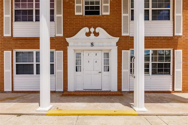 a front view of a house with a tub