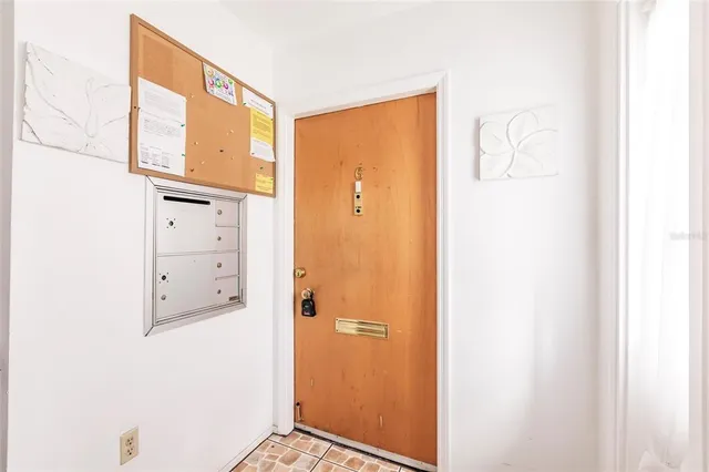 a view of a bathroom with mirror