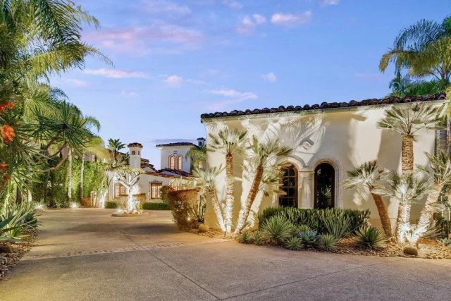 a view of a street with a building in front of it