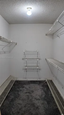 a view of a livingroom with furniture