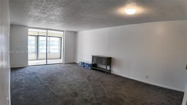 a view of hallway with windows