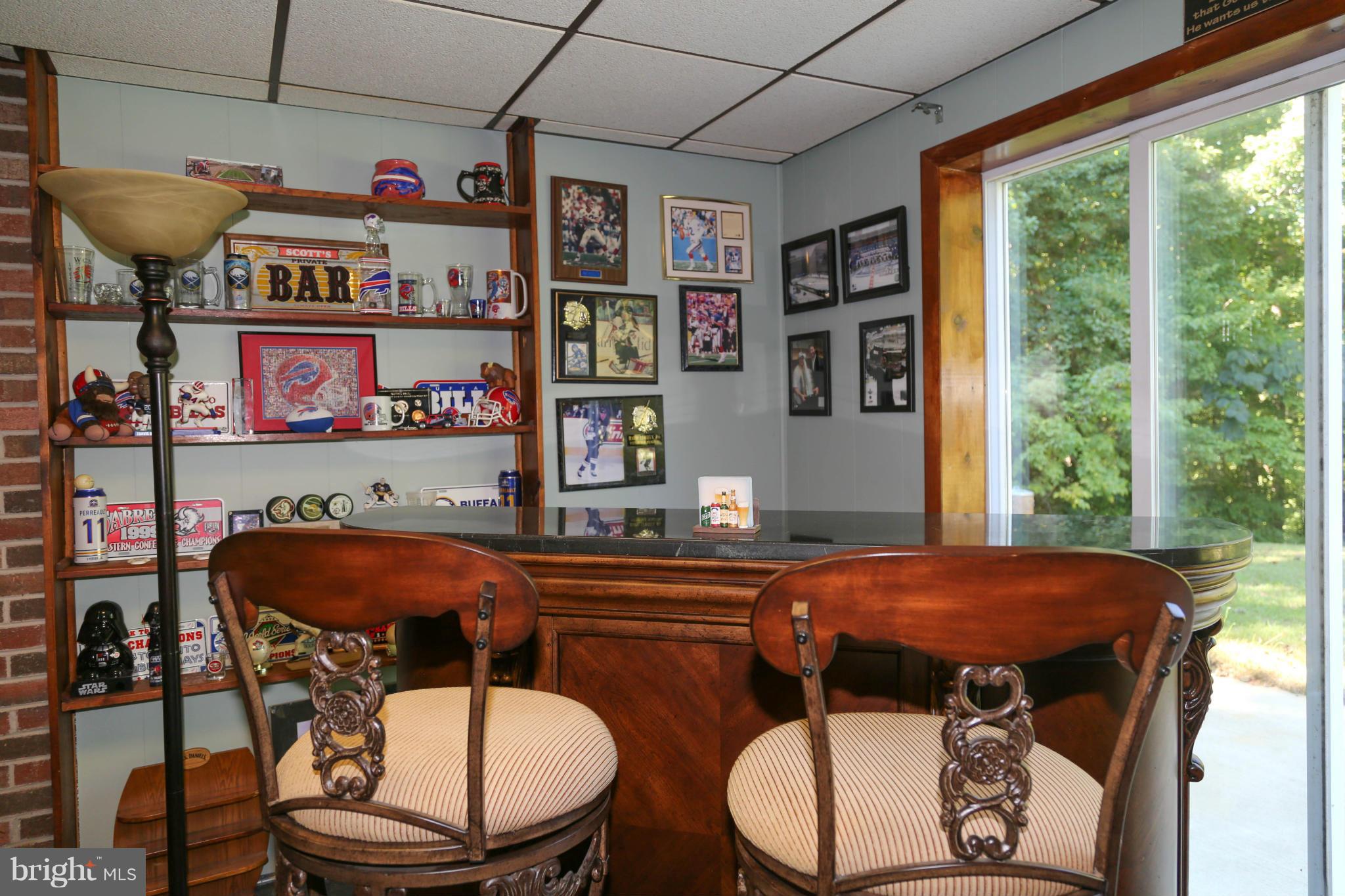 1190 Plum Point Road Huntingtown, MD 20639 - Photo 14 of 20 a view of a dining room with furniture window and outside view