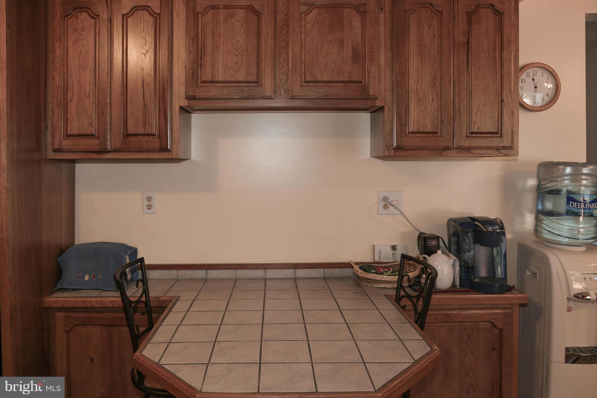 1190 Plum Point Road Huntingtown, MD 20639 - Photo 10 of 20 a view of a room with rack on the wall