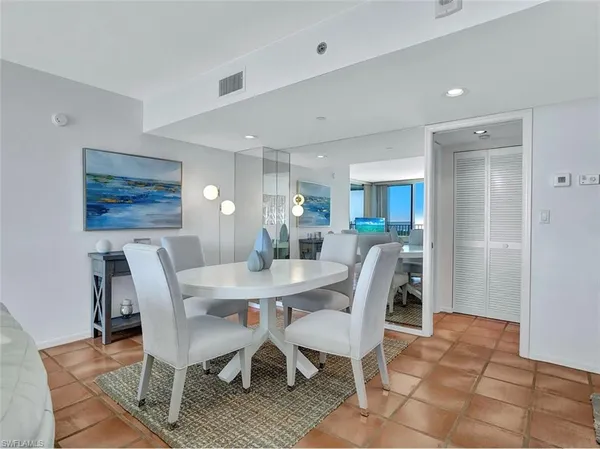 a view of a dining room with furniture