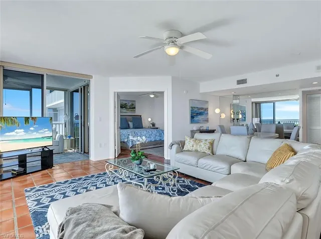 a living room with furniture and view of living room