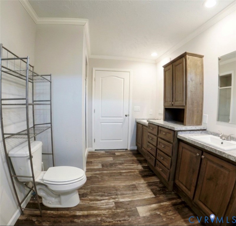 601 Middle Fork Road Palmyra, VA 22963 - Photo 14 of 22 a bathroom with a toilet a sink and shower