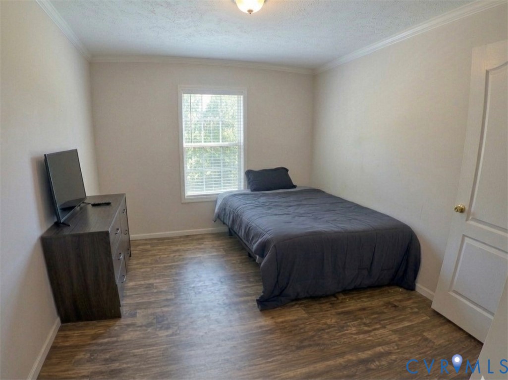 601 Middle Fork Road Palmyra, VA 22963 - Photo 16 of 22 a bedroom with a bed and a window