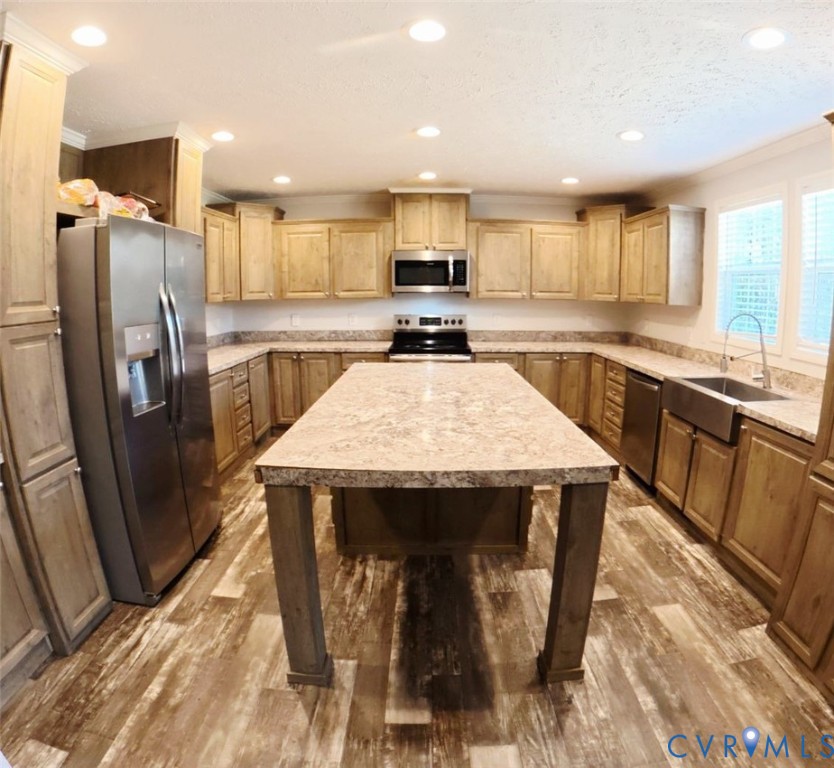 601 Middle Fork Road Palmyra, VA 22963 - Photo 2 of 22 a kitchen with stainless steel appliances wooden cabinets granite counter tops a stove a sink and a refrigerator